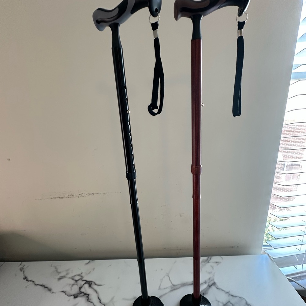 New- 2 pair of adjustable canes black and wood look